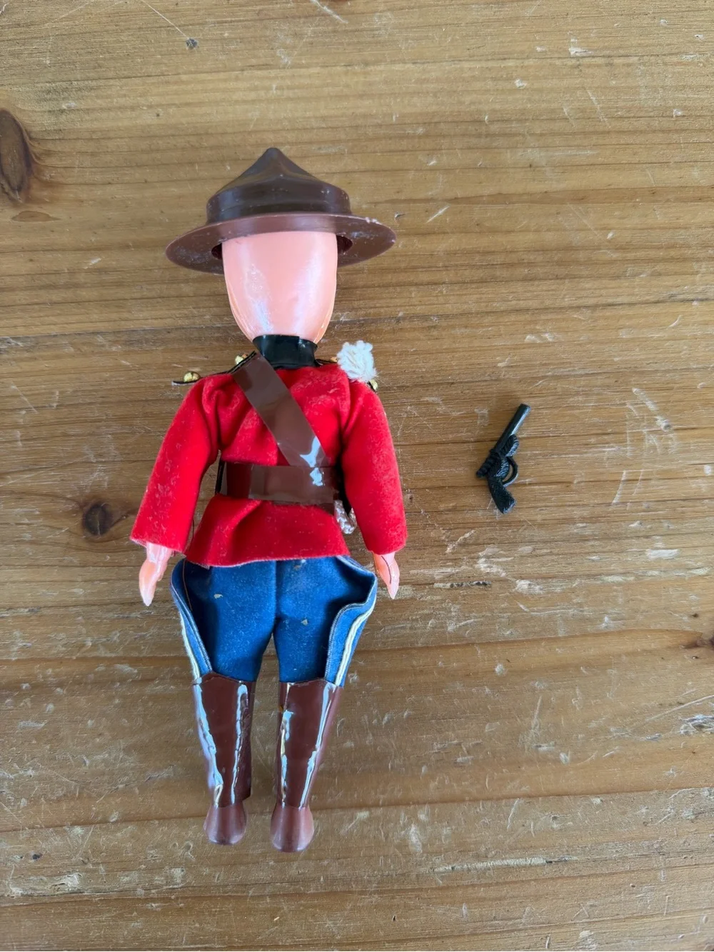 Vintage-Inspired Red Mountie Doll Toy with Blue Pants